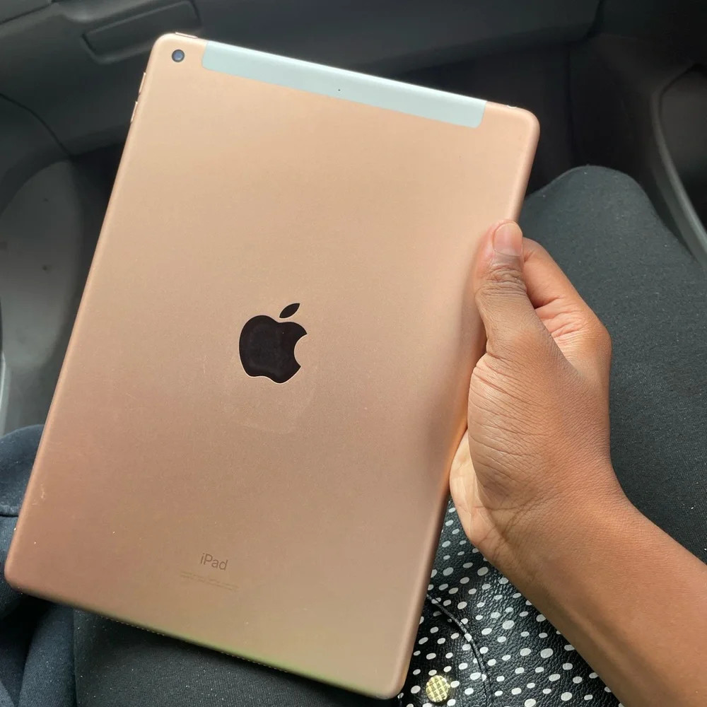 Apple Tablet with White and Silver Design